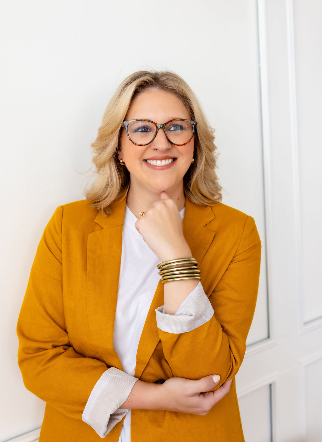 Close portrait of Ally Gore in a yellow jacket